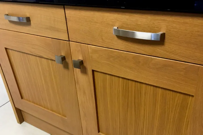 Clean Knobs and Handles of kitchen cabinet