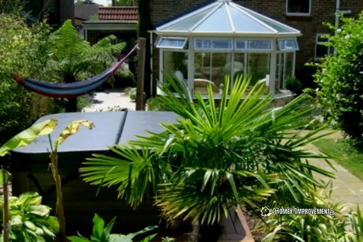 Outdoor Tub Surrounded by Ferns