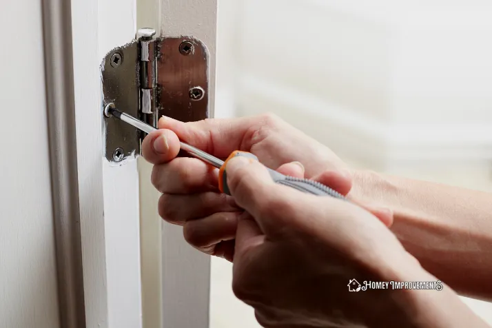 Removing the Hinges of the Door